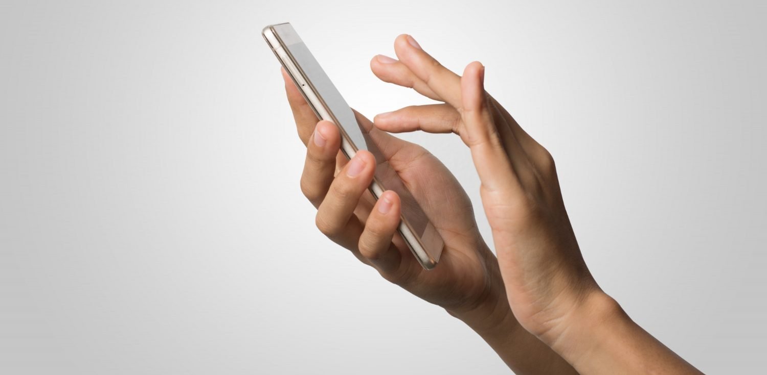 woman-hand-holding-smart-phone-blank-screen-copy-space-hand-holding-smartphone-isolated-white-background